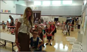  ?? MELISSA SCHUMAN - MEDIANEWS GROUP ?? Mrs. Stickles’s first grade class lines up and gets ready to head to their room.