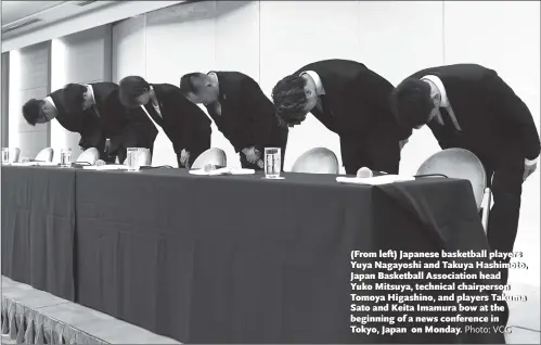  ?? Photo: VCG ?? (From left) Japanese basketball players Yuya Nagayoshi and Takuya Hashimoto, Japan Basketball Associatio­n head Yuko Mitsuya, technical chairperso­n Tomoya Higashino, and players Takuma Sato and Keita Imamura bow at the beginning of a news conference in Tokyo, Japan on Monday.