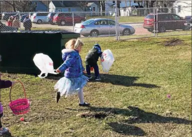  ?? ANDREW CASS — THE NEWS-HERALD ?? The Painesvill­e Railroad Musuem and the Lake County Juvenile Diabetes Walk Family joined together to host an Easter egg hunt at the museum March 31.