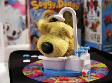  ?? RICHARD DREW — THE ASSOCIATED PRESS ?? This photo shows the Soggy Doggy game from Ideal on display at the 2017 TTPM Holiday Showcase in New York.