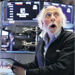  ?? PHOTO: GETTY IMAGES ?? Bad day . . . A New York Stock Exchange trader reacts to the fall in prices.