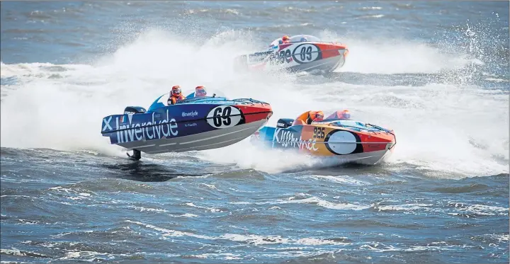  ??  ?? WAVE RIDERS: Dino Zavaroni and Gordon Wicklow of Team Inverclyde gear up for the first ever P1 Scottish Grand Prix of the Sea off Greenock Esplanade today and tomorrow