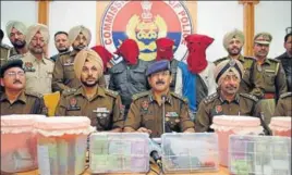  ?? PARDEEP PANDIT/HT ?? Police officials presenting the accused before the media in Jalandhar Tuesday.