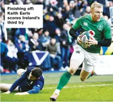  ??  ?? Finishing off: Keith Earls scores Ireland’s third try