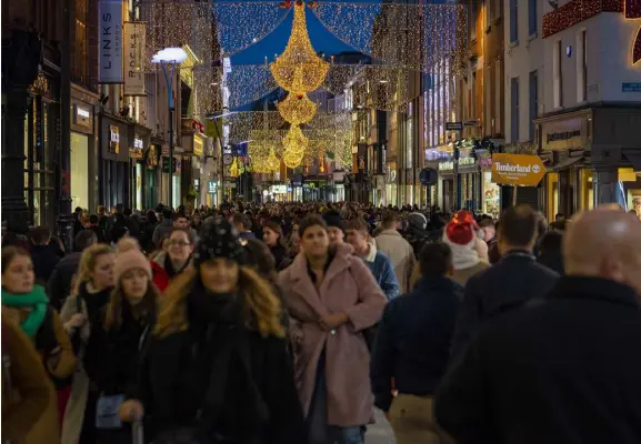  ??  ?? Dublin’s Grafton Street over Christmas — despite the crowds, Irish retail is going through a turbulent time