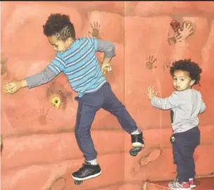  ?? CONTRIBUTE­D PHOTO ?? Brothers test their skill on the climbing wall at the Creative Discovery Museum, where “Run! Jump! Fly! Adventures in Action” exhibit continues through Jan. 13.