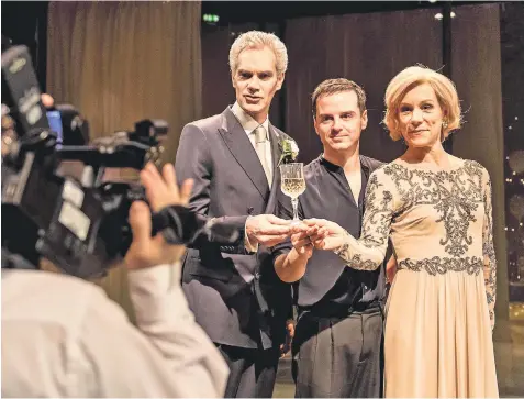  ??  ?? Toast of the town: Angus Wright, Andrew Scott and Juliet Stevenson in Hamlet