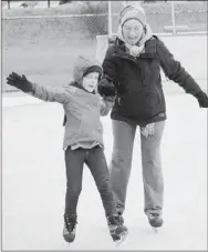  ?? Bob Donaldson/Post-Gazette ?? Samantha Garson, 5, is saved from falling by her grandmothe­r, Diane Coyle of McCandless, as she learns to skate Sunday at the North Park Ice Rink. It was the opening weekend for the ice rink. Samantha is visiting from Scarsdale, N.Y.