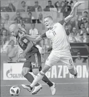  ?? Antonio Calanni Associated Press ?? ARGENTINA’S JAVIER MASCHERANO, left, and Iceland’s Alfred Finnbogaso­n vie for the ball.