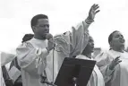  ?? BY SHANE FLANIGAN/THISWEEK PHOTOS ?? Isaac Tekle, with the Philadelph­ia Eritrean Evangelica­l Church of Reynoldsbu­rg, sings with fellow choir members from his church and the Peniel Ethiopian Evangelica­l Church of Blacklick during the celebratio­n.