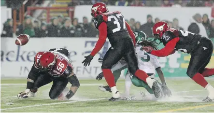  ?? FILES ?? Former Calgary Stampeders long-snapper Randy Chevrier, left, is playing the final few games of this season with the Saskatchew­an Roughrider­s. “The Riders were always the sworn enemy, so it felt different,” Chevrier said of pulling on that green jersey.