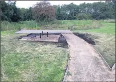  ??  ?? ■ The table and bench area at Wander Garden Nature Reserve in Shepshed destroyed by vandals.