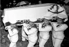  ??  ?? The coffin of Nik Muhammad Baihaqy being brought to the Kampung Limbat Muslim cemetery in Pasir Tumboh, Kelantan. - Bernama photo