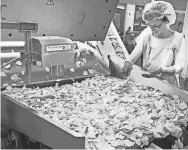  ?? FILE ?? In his State of the Union speech, President Biden missed the real reason a bag of chips is partially empty.