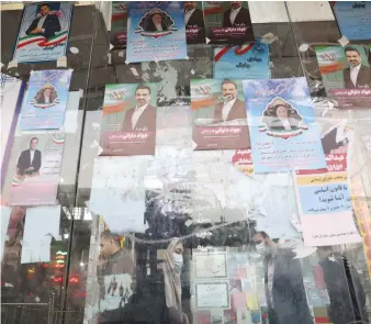  ?? (West Asia News Agency/Reuters) ?? CAMPAIGN POSTERS are on display in Tehran ahead of the Iranian parliament­ary election.