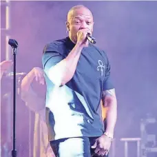  ??  ?? Dr. Dre’s solo debut set the rap standard for years to come. DAVE MANGELS/GETTY IMAGES FOR COACHELLA