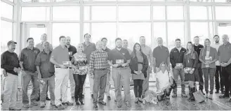  ??  ?? GHBA members who are donating to the GHBA Benefit home were honored at a luncheon at the home that is being built by Trendmaker. Here, they received an appreciati­on award.