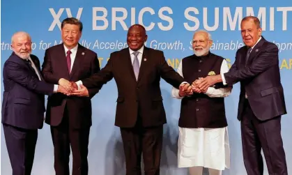  ?? Photograph: Reuters ?? (From left) Luiz Inácio Lula da Silva, Xi Jinping, Cyril Ramaphosa, Narendra Modi and Sergei Lavrov at the Brics summit in Johannesbu­rg, South Africa, in 2023.