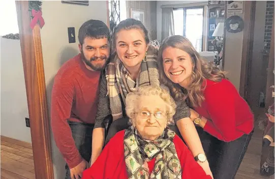  ??  ?? Colin Hodd, left, and his sisters Lindsay Hodd and Megan Hodd, pose with their grandmothe­r, Ella Robichaud. The family lost Ella in February, making this Christmas much different for their family, on top of the changes they'll already face because of COVID-19.