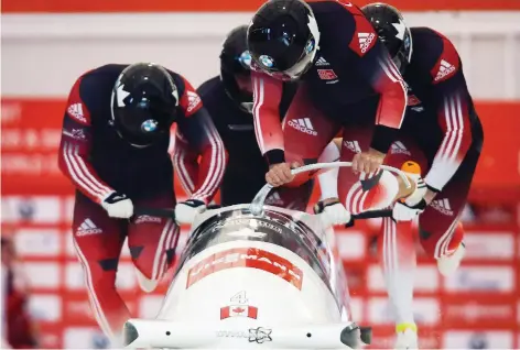  ?? THE CANADIAN PRESS/FILES ?? Canada’s Chris Spring, Alexander Kopacz, Joshua Kirkpatric­k, and Derek Plug compete in a World Cup bobsled event in Calgary in 2014. WinSport says the track is at the end of its life and without more government funding, will close indefinite­ly at the end of March.