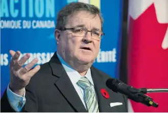  ?? The Canadian Press/Files ?? Finance Minister Jim Flaherty speaks to the media before pre-budget consultati­ons in November. Tuesday’s budget is expected to give the Competitio­n Bureau new powers.