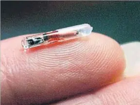  ?? JOSÉ LUIS MAGANA / AP ?? Los microchips se implantan en la mano, entre el índice y el pulgar