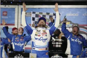  ?? JOHN RAOUX — THE ASSOCIATED PRESS ?? Ricky Stenhouse Jr. celebrates in Victory Lane after winning the NASCAR Daytona 500 auto race at Daytona Internatio­nal Speedway, Sunday, Feb. 19, 2023, in Daytona Beach, Fla.