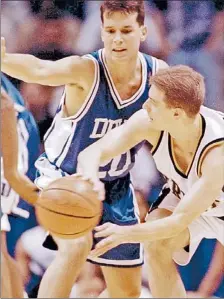  ?? | GETTY IMAGES ?? Chris Collins defends against Purdue’s Matt Waddell during his playing days at Duke in 1994. Collins says he is ‘‘forever grateful for everything Duke has meant to me.’’