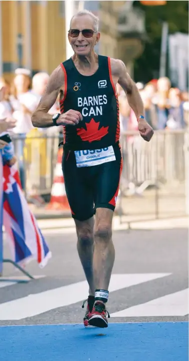  ??  ?? RIGHT Charlie Barnes competes at the ITU World Championsh­ips in Rotterdam, Netherland­s