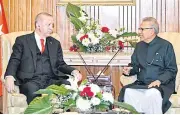  ?? REUTERS ?? Pakistan’s President, Arif Alvi, right, meets with Turkish President Tayyip Erdogan in Islamabad on Thursday.