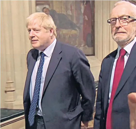  ??  ?? Boris Johnson and Jeremy Corbyn enter the Lords for the Queen’s Speech yesterday