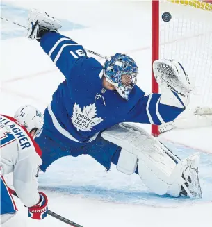  ?? RICK MADONIK TORONTO STAR ?? The Canadiens’ Brendan Gallagher beats Leafs goalie Frederik Andersen high for the game-winner late in the third period on Saturday night.