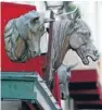  ?? Photo: Reuters ?? Sign of the times: A Parisian butcher fronts his store with horses’ heads.
