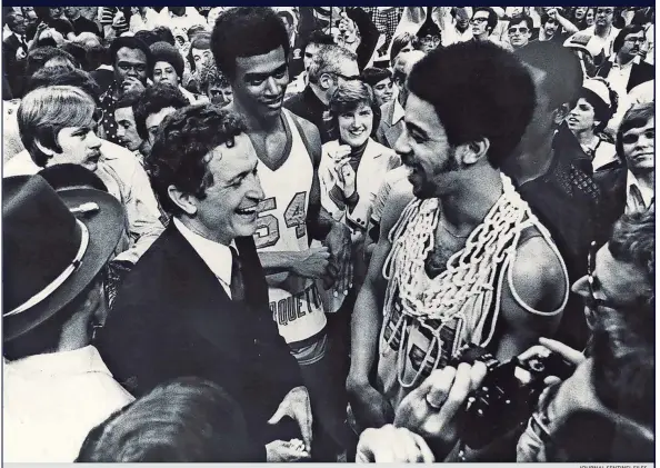  ?? JOURNAL SENTINEL FILES ?? After defeating North Carolina in Atlanta, head coach Al McGuire, Jerome Whitehead and Bernard Toone (right) celebrate Marquette’s only NCAA basketball championsh­ip in 1977.
