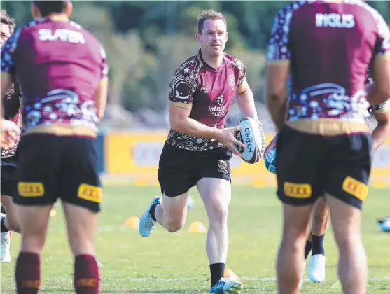  ?? Picture: ADAM HEAD ?? AT HOME: Michael Morgan and the Queensland Origin team hold an opposed session at Sanctuary Cove ahead of Game 1 in Melbourne.