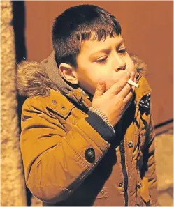  ?? Picture: AP. ?? Just one puff on a cigarette at an early age is enough to hook almost 70% of people, a study says.