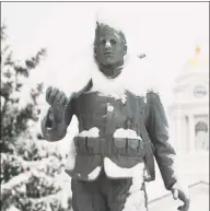  ?? Brian A. Pounds / Hearst Connecticu­t Media ?? The doughboy statue is covered in snow outside Town Hall in Milford on Friday.