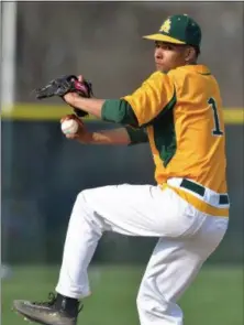  ?? MORNING JOURNAL FILE ?? Amherst pitcher Xavier Moore throws a pitch at an April game.