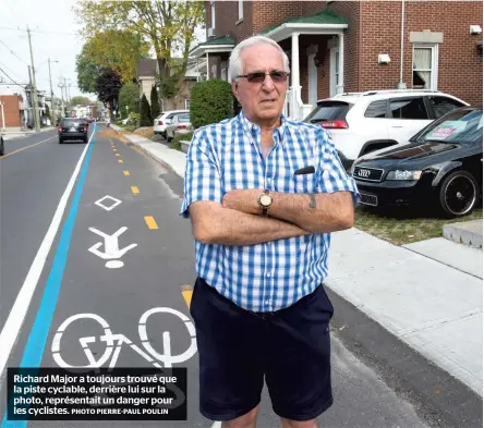  ?? PHOTO PIERRE-PAUL POULIN ?? Richard Major a toujours trouvé que la piste cyclable, derrière lui sur la photo, représenta­it un danger pour les cyclistes.