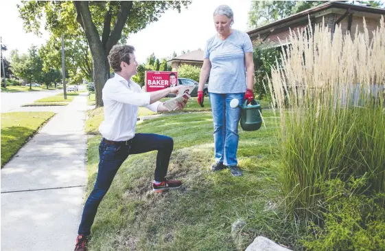  ?? PETER J THOMPSON / NATIONAL POST ?? Etobicoke Centre Liberal candidate Yvan Baker canvasses the west Toronto riding recently. Premier Doug Ford represents the riding next door, Etobicoke North, provincial­ly. “I don’t go out of my way to talk about Doug Ford,” Baker said.