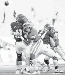  ?? Godofredo A. Vásquez / Staff photograph­er ?? QB Luke McCaffrey and Rice are off to an 0-2 start after losses to Arkansas — which also beat the Owls’ upcoming opponent, Texas — and UH.