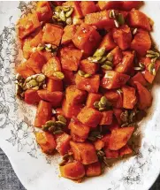  ?? TY MECHAM /SHADOW MOUNTAIN ?? Thursday’s spicy maple sweet potatoes with cinnamon pepitas.