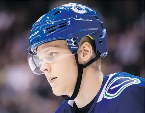  ?? DARRYL DYCK/THE CANADIAN PRESS ?? Canucks defence prospect Olli Juolevi had surgery on his back in the off-season and played his first pre-season game Wednesday against the Calgary Flames, registerin­g 16:58 of ice time. The 2016 first-round pick is a long shot to make the opening-night roster.