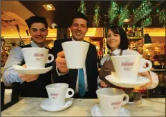  ??  ?? MSP Jamie Hepburn got some training from two of the Busby Hotel’s modern apprentice­s, Andrew Galston and Loren MacGregor