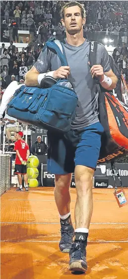  ?? Picture: Getty. ?? Andy Murray walks off court after his disappoint­ing exit in Rome at the hands of Fabio Fognini.