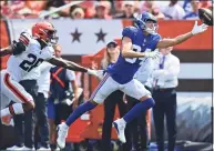  ?? David Dermer / Associated Press ?? Giants wide receiver David Sills, right, stretches but cannot reach the ball under pressure from Browns cornerback Greedy Williams during a preseason game on Sunday in Cleveland.
