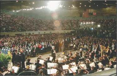  ?? (AP File/Wilfredo Lee) ?? A capacity crowd attends the April 23, 1995, prayer service at the State Fair Arena in Oklahoma City for the bombing victims.