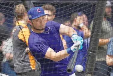  ?? Associated Press ?? Batting practice: Chicago Cubs' Seiya Suzuki takes a swing during batting practice ahead of the Cubs’ series against the St. Louis Cardinals at the MLB World Tour London Series Friday in London Stadium.