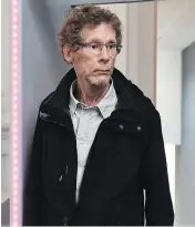  ?? REMY GABALDA / AFP / GETTY IMAGES ?? Gilles Bertin arrives at court in France on Wednesday after spending 28 years on the run after a bank heist.