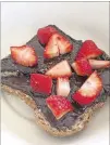  ?? CONTRIBUTE­D BY WENDELL BROCK ?? Upbeet’s Sister Hazelnut toast is laden with dark chocolateh­azelnut butter, strawberri­es and sea salt.